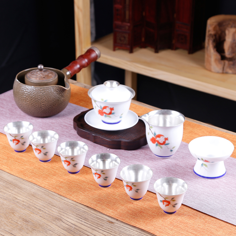 The ancient sheng up coppering. As silver tea set hand - made kung fu tea cup lid bowl of a complete set of blue and white porcelain is jingdezhen ceramics