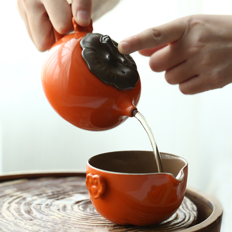 A Live chicken in persimmon persimmon tea set suit household ceramics by hand is the best holiday gift box of the teapot teacup set of kung fu