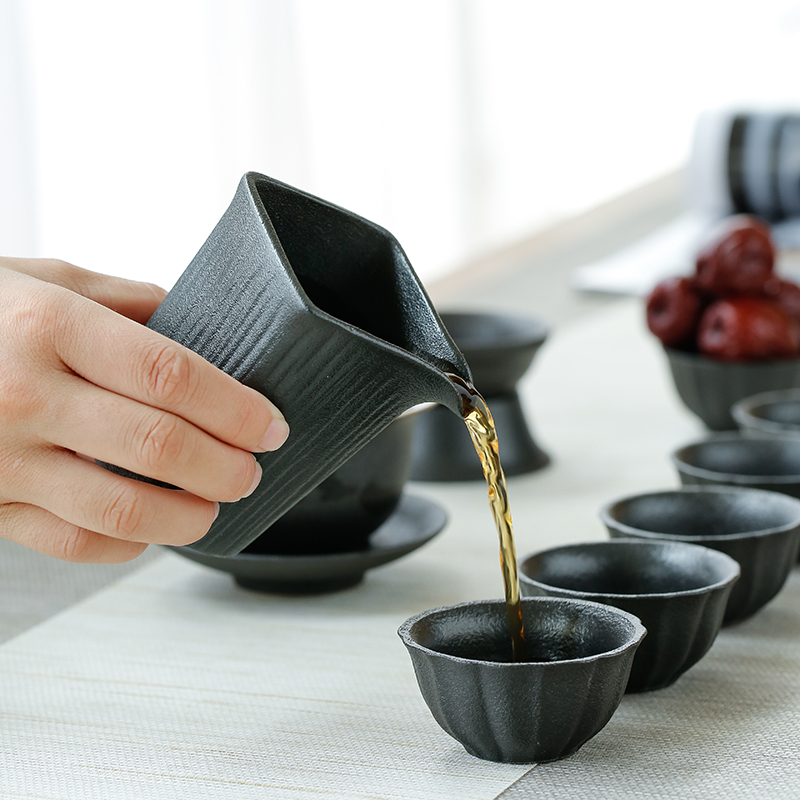 Kung fu tea sets tea cups of household contracted Japanese black ceramic teapot tea tureen of a complete set of modern office