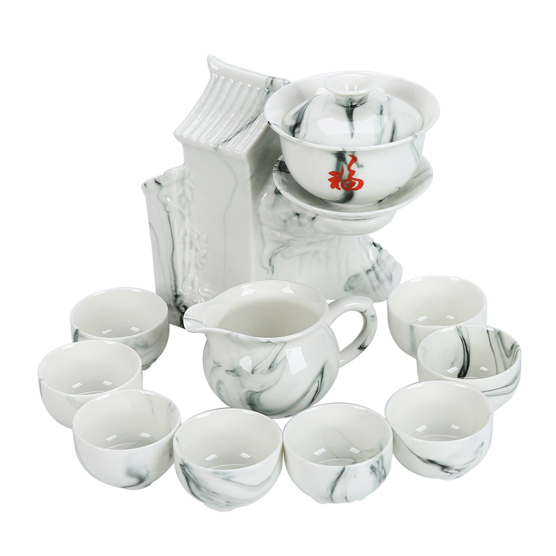 Innovative ink kung fu tea set ceramic gift box of a complete set of lazy hot tea. Preventer household whole semi - automatic teapot