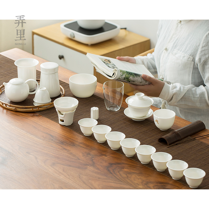 Get in dehua white porcelain suet jade suit household kung fu tea tureen of pottery and porcelain of a complete set of drinking tea pot gift box