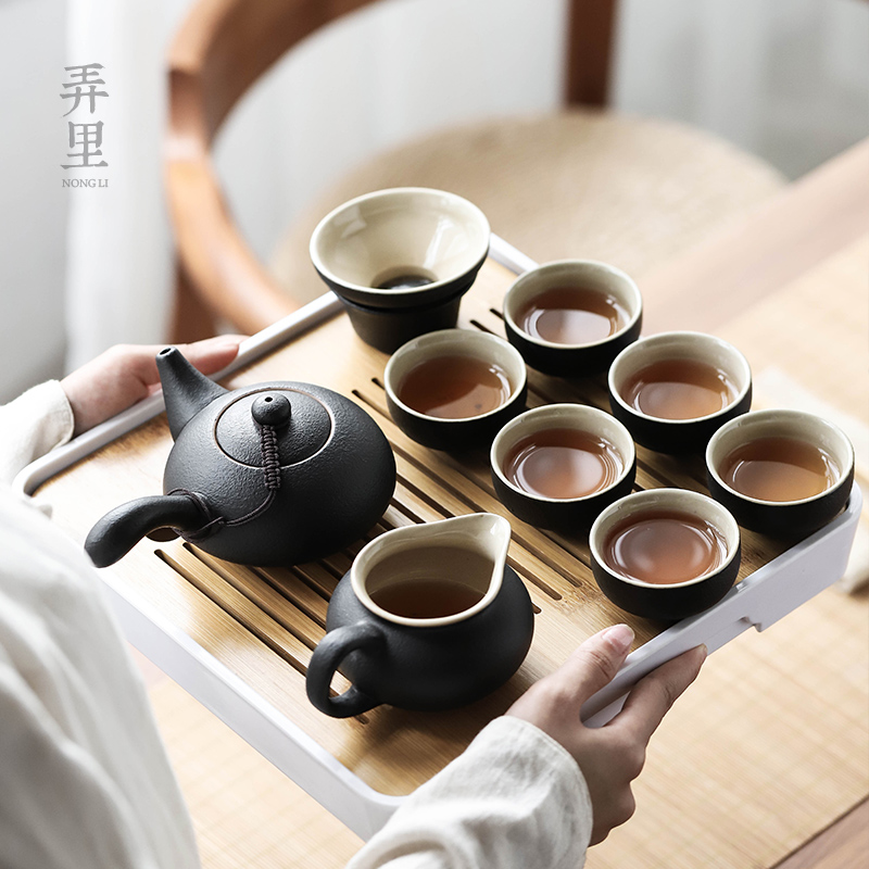 Kung fu tea set suit household contracted the teapot tea tray ceramic portable travel Japanese tea tea set office