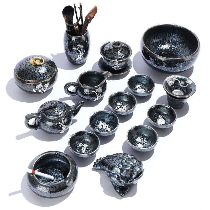 Is the best product of a complete set of kung fu tea set built red glaze coppering. As the silver tea set of household ceramic lid bowl