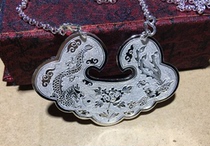 S990 pure handmade chisel carving dragon and pineapple lock sheet foot silver lock sheet gram price RMB18