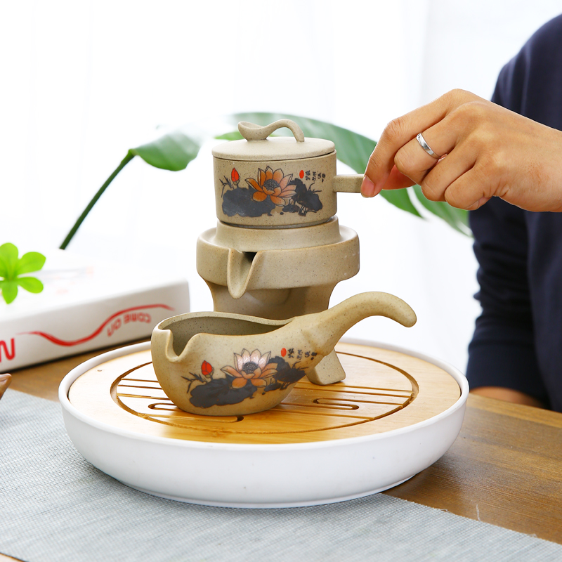Lazy tea is semi automatic kung fu tea set rotating water ceramic purple sand cup restoring ancient ways the whole household