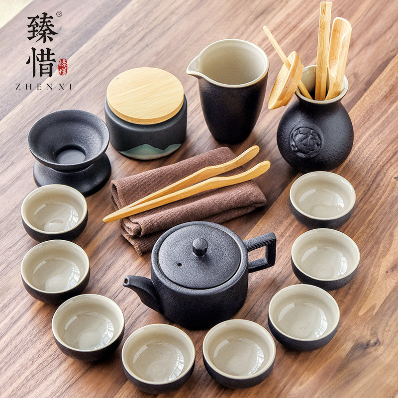 By understanding the modern black ceramic kung fu tea set household contracted mini Japanese tea tea tray of a complete set of the teapot