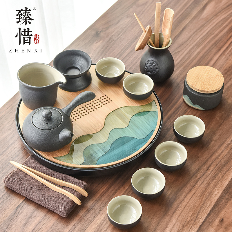 By understanding the modern black ceramic kung fu tea set household contracted mini Japanese tea tea tray of a complete set of the teapot