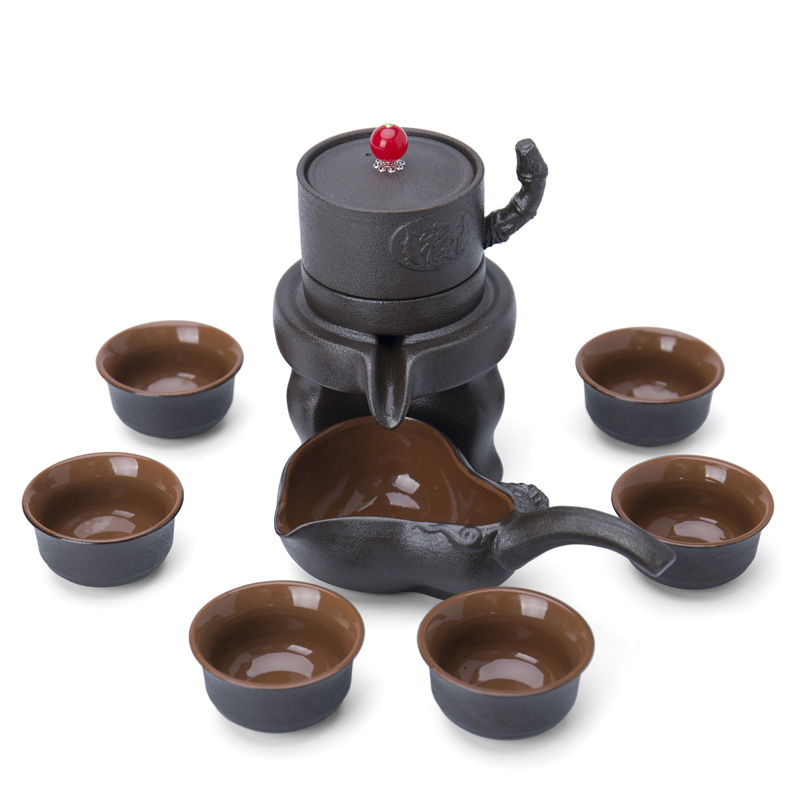 Jane quality household retro black pottery of a complete set of lazy semi - automatic teapot stone mill kung fu tea set ceramic tea set