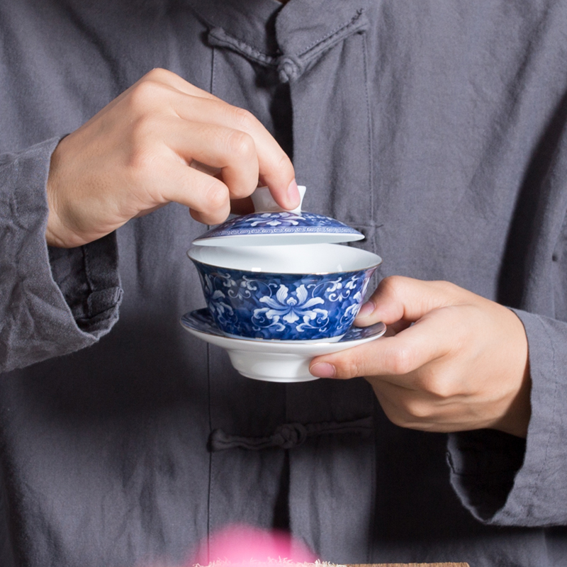 NiuRen blue - and - white kung fu tea set ceramic household whole creative teapot set of tea cups tureen gift boxes