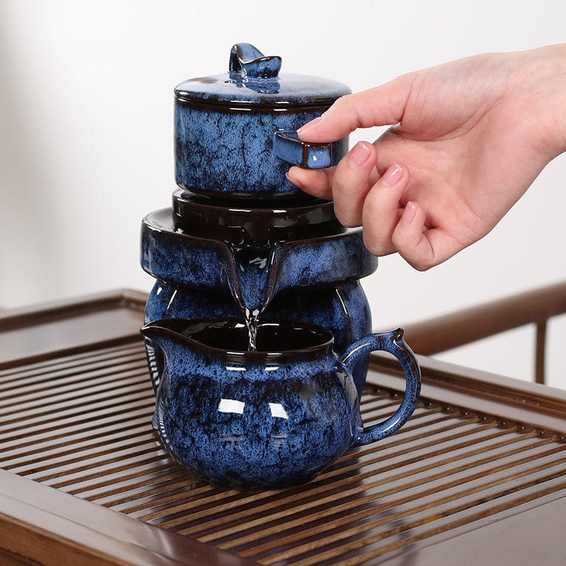 NiuRen porcelain masterpieces kung fu tea set home built lamp automatic variable lazy stone mill make tea, tea tray was suit