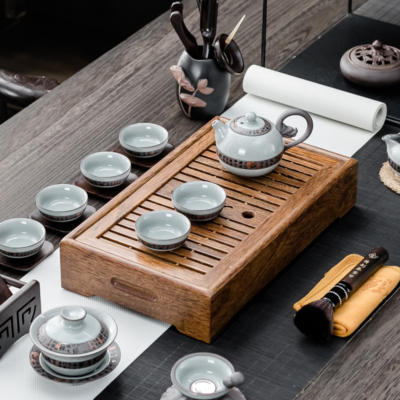 NiuRen spend pear wood tea tray of a complete set of purple sand tea sets tea sea blue elder brother up electrical TaoLu boiled tea tea set