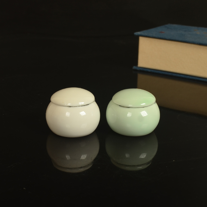 The new ceramic small grape with cover powder sealed storage jar paste little porcelain celadon receives The general