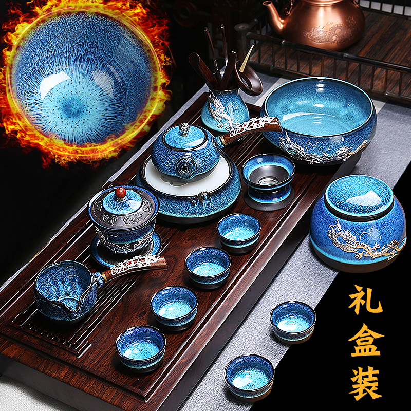 Build light coppering. As silver tea set household kung fu tea set a complete set of ceramic cup tea tray lid bowl gift boxes