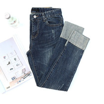 Large size jeans female fat mm2020 new fashion Korean version of 200 pounds fat sister flanging high waist small feet nine-point pants