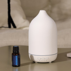 Essential oil aromatherapy machine atomized ceramic humidifier household silent bedroom automatic fragrance ultrasonic spray high-end