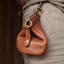 KONGLONGMOGU tanned cowhide retro trumpet running bag simple solid color niche Mini coin bag Coin Coin Purse