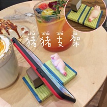 Korean ins same girl pig accompany you to watch TV cute pig mobile phone bracket support socket