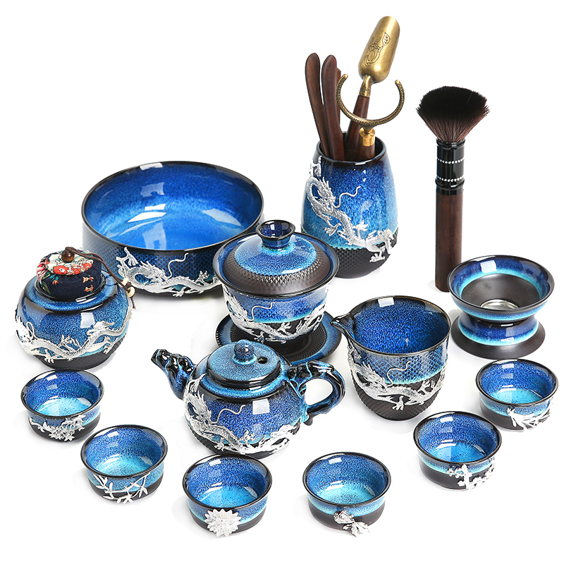 Build light coppering. As silver tea set household kung fu tea set a complete set of ceramic cup tea tray lid bowl gift boxes