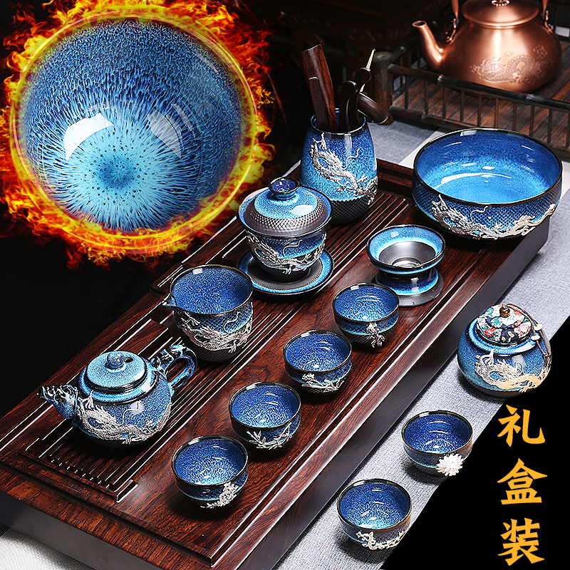 Build light coppering. As silver tea set household kung fu tea set a complete set of ceramic cup tea tray lid bowl gift boxes