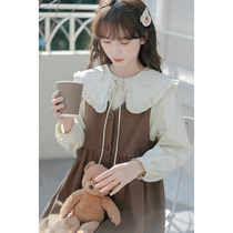 Lace-up doll collar shirt women 2022 spring new wild chic design sense loose wooden ear shirt