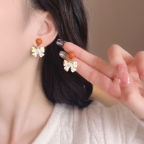 Small bow cute Pearl wave dot small earrings Net red 2021 New Tide niche ear jewelry