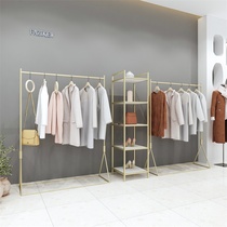 Gold hanger clothing store display floor childrens clothing for men the bending red clothes display shelves