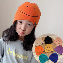 Children's front and rear expressions autumn and winter new embroidered smiling face children's knitted hat Korean version of baby pullover wool