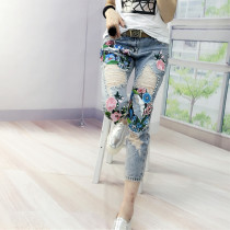 European station 2021 spring and summer fashion new European heavy industry embroidery flower nail beads worn denim pants women tide