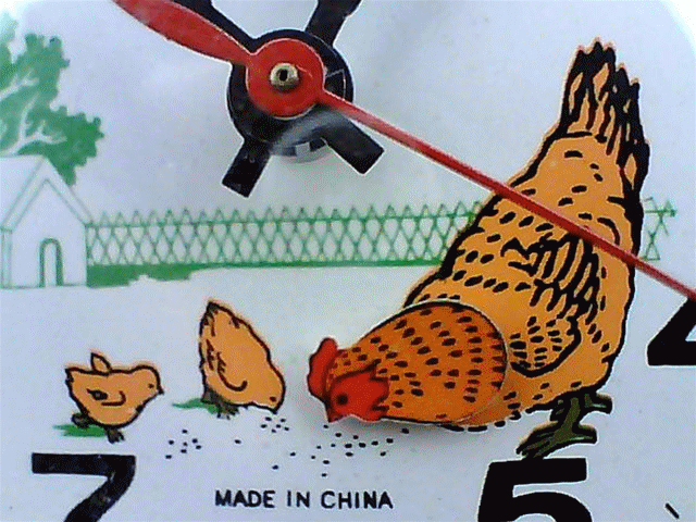 秒针每走一下,鸡头就动一下