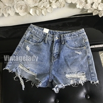 2018 Summer new high waist light-coloured denim shorts women rip edge looser 100 hitch a hole wide leg hot pants tide