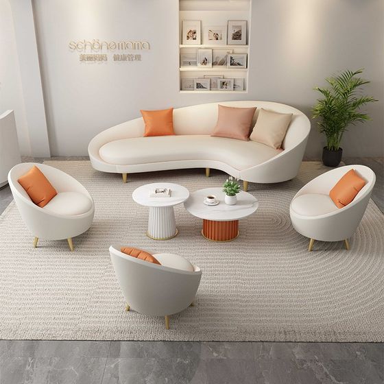 Beauty salon small sofa curved milk white beige net red beauty salon reception sofa coffee table combination
Beauty salon small sofa curved milk white beige net red beauty salon reception sofa coffee table combination