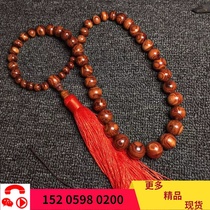 Sea yellow Arhat beads Buddha beads hand-held Hainan yellow pear wood positive core tiger skin pattern grimace hand string