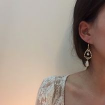 South Korea long pearl drop earrings 2021 New Tide temperament advanced sense face repair Net red earrings jewelry