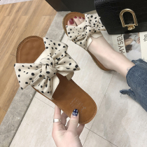 Summer new slippers female Korean version 2021 one-word bow pregnant women soft bottom wild wear fashion beach shoes