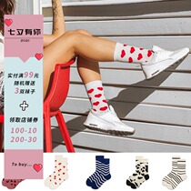 Buy three get one free couple cute banana Europe and the United States INS sports fitness men and women pure cotton socks board shoes mid-tube tide socks