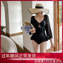Sanya holiday retro solid color net red hot spring holiday black slim long sleeve triangle sexy one-piece swimsuit female summer