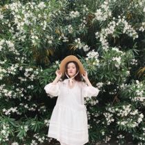 The same summer white lantern sleeve dress with loose doll skirt