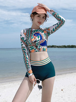 Hot spring swimsuit female 2021 new split flat horn fairy fan belly thin Korean ins long sleeve sunscreen swimsuit