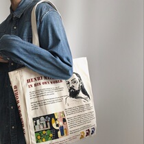 KAFKAsSHOP Portrait Newspaper Canvas Bag Men and Women Neutral Large Capacity Personality Simple Street Shots Hand bag Han Chao