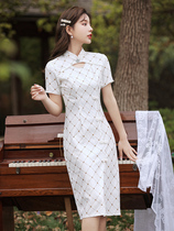 Cheongsam 2021 new female summer young improved version of the girl white plaid dress short small man