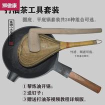 Oil tea pot and oil tea tool set with round bottom iron pot to fish the wooden hammer handle