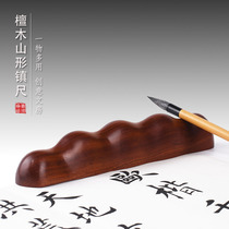 High-grade mahogany town ruler red sandalwood mountain-shaped paperweight large solid wood pen holder pen holder pen support pen mountain calligraphy supplies