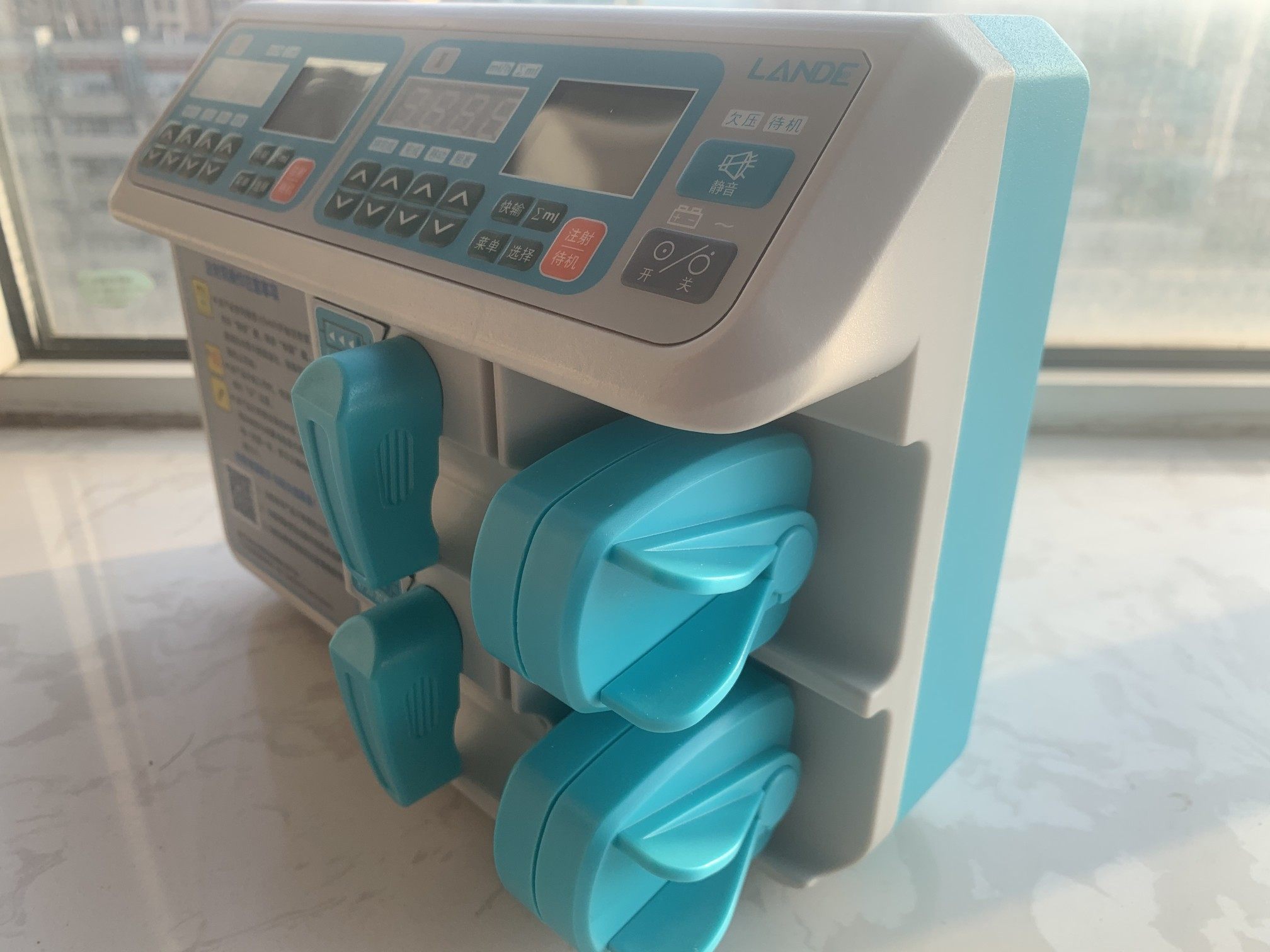 微量泵外观小巧精致,功能强大使用 方便可自动检测匹配型号,有报警