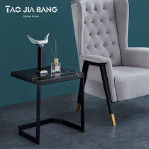 Square corner few Lauren black gold natural marble side few postmodern minimalist sofa next to stainless steel coffee table