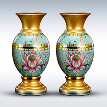 A pair of Buddha vases in front of the Buddha