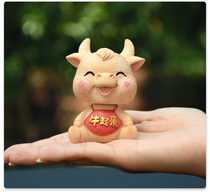 Car pendulum bull air rush to recruit wealth car personality creative high-end cute Net red car shaking head doll Zodiac cow
