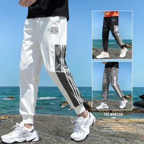 Mens casual pants 2021 new spring Korean edition nine-point sports pants slim teen men pants manufacturers