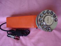 Early production dial telephone call line telephone communication equipment items collection of old-fashioned objects