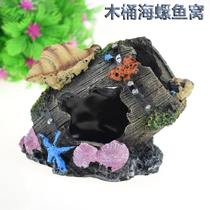 The fish tank is decorated to avoid the cave The aquarium is decorated with a shrimp house