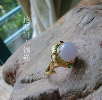 18K gold purple emerald ring inlaid with a fine link to the diagram